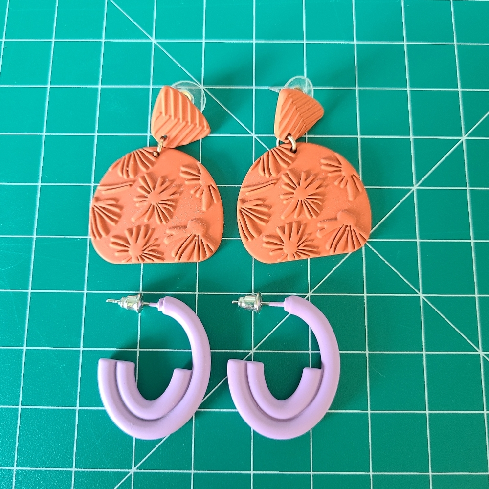 Orange and lavender pierced earrings